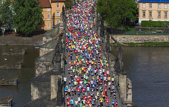 Runners crossing the river