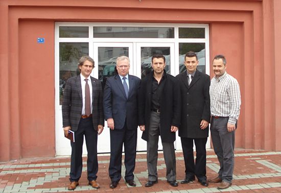 Mr Hrehorowicz with the Organising Committee in front of the Sports Hall Mr Hrehorowicz with the Organising Committee in front of the Sports Hall