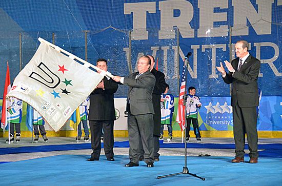 FISU Flag was passed to the representatives of the OC Granada 2015 FISU Flag was passed to the representatives of the OC Granada 2015