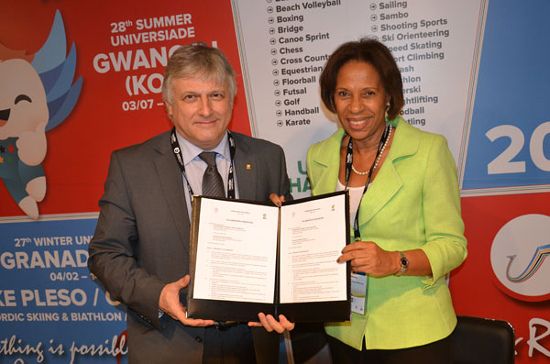 At the FISU/Universiade booth with INF and FISU At the FISU/Universiade booth with INF and FISU