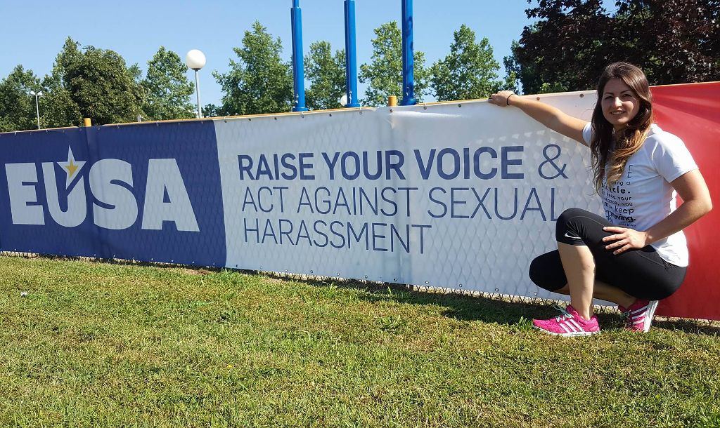 Anett with the projects banner