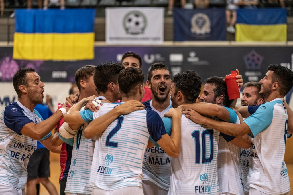 Men celebrating at Futsal