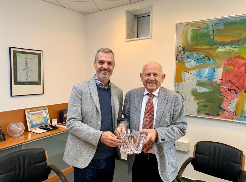 Janez Kocijancic receiving his Order of Merit award from Matjaz Pecovnik