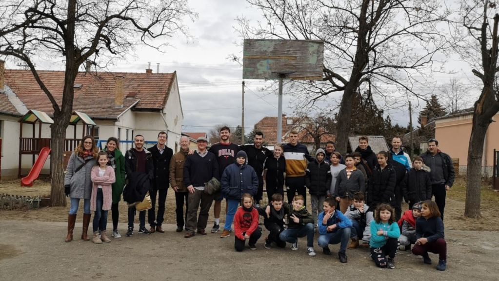Group photo with the children of John Wesley Primary School