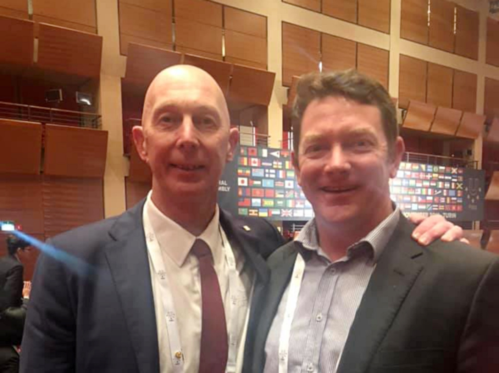 FISU Oceania outgoing President Mr Doulton and new President Mr Schmude