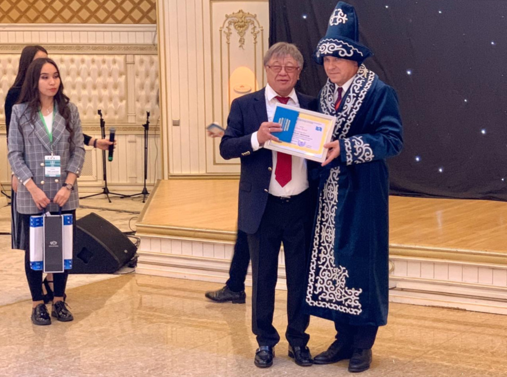 EUSA President Mr Adam Roczek receiving honorary title