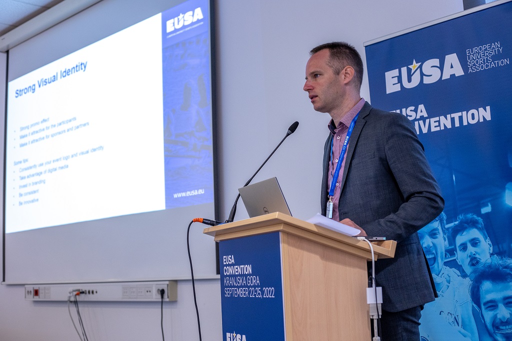 Mr Andrej Pisl presenting about Visual Identity and Media