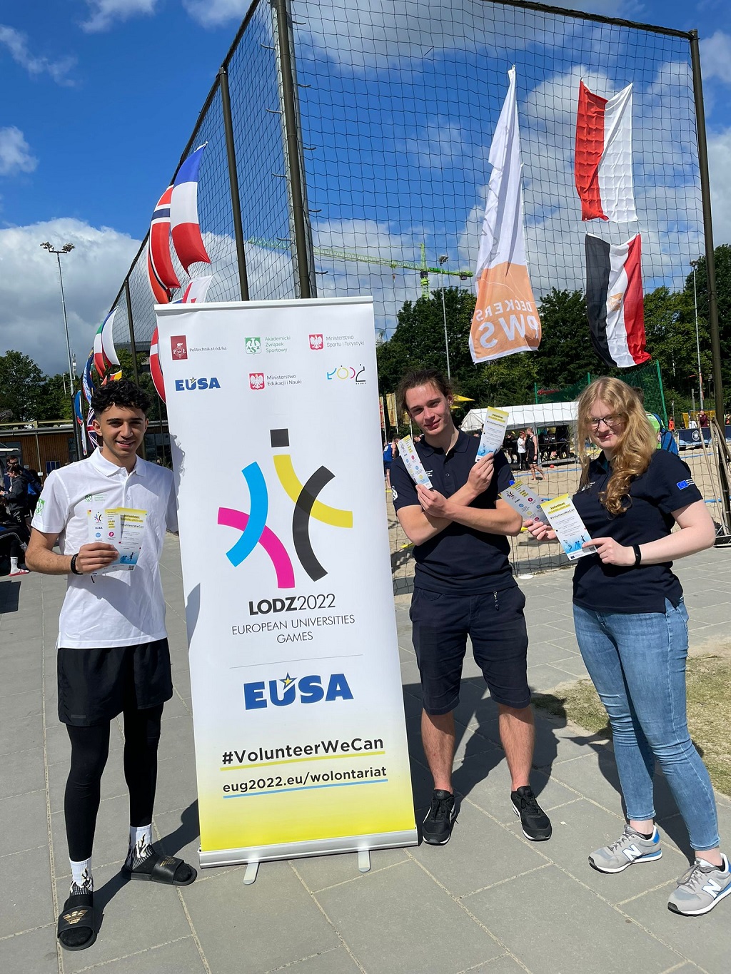 Volunteers posing with EUG 2022 banner 